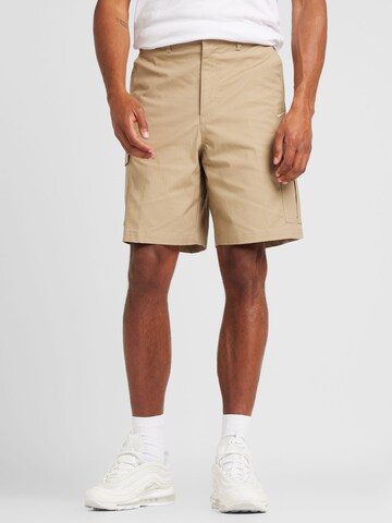 Regular Pantalon cargo 'CLUB' Nike Sportswear en vert : devant