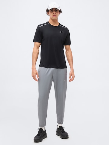 T-Shirt fonctionnel 'MILER' NIKE en noir