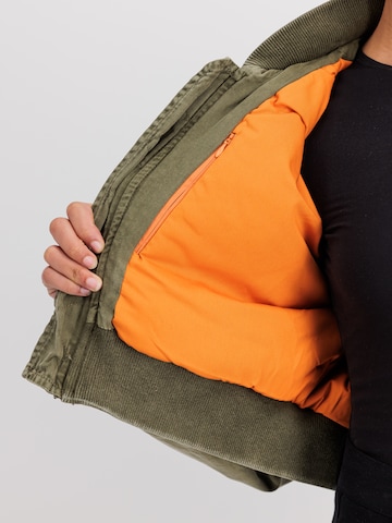 Veste d’hiver 'Multipocket Flight' ALPHA INDUSTRIES en vert