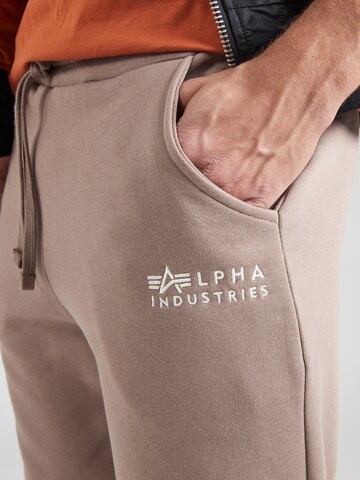 ALPHA INDUSTRIES Ozke Hlače | rjava barva