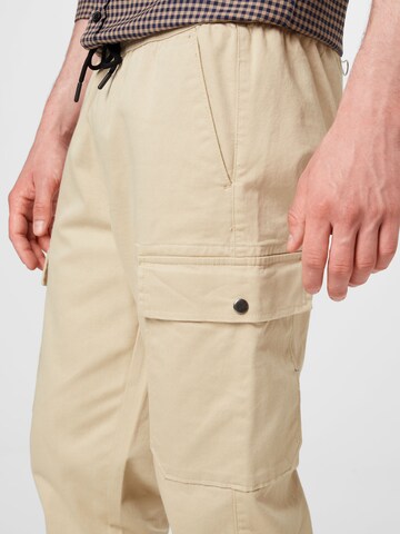 Tapered Pantaloni cargo di BURTON MENSWEAR LONDON in grigio