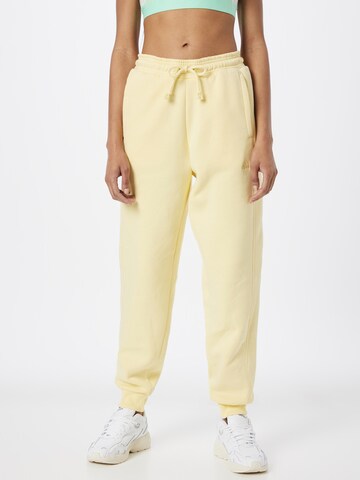 ADIDAS SPORTSWEAR Tapered Workout Pants 'All Szn Fleece' in Yellow: front