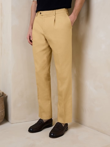 Next - regular Pantalón de pinzas 'N. Premium' en amarillo: frente