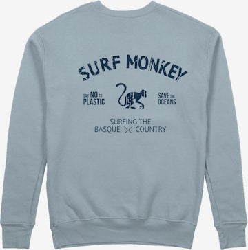 Sweat-shirt 'Rette das Ozean' Surf Monkey en bleu : devant