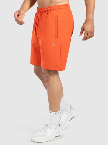 Loosefit Pantalon de sport ' Edin ' Smilodox en orange