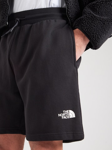 juoda THE NORTH FACE Standartinis Kelnės 'SIMPLE DOME'
