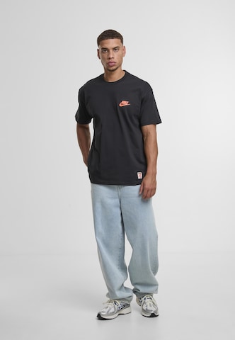 NIKE T-Shirt in Schwarz