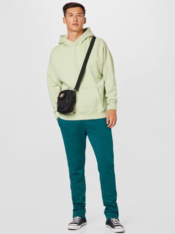 Urban Classics Regular Trousers in Green