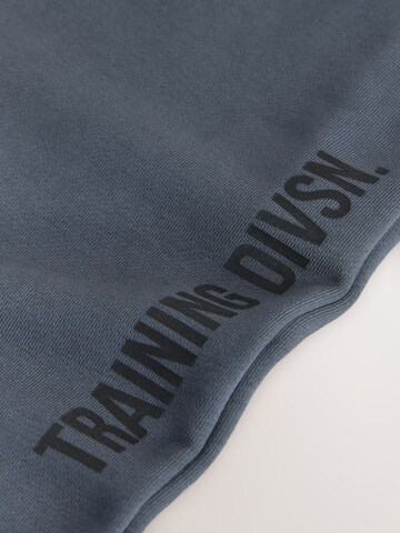 Next Tapered Hose 'Active Training Division' in Grau