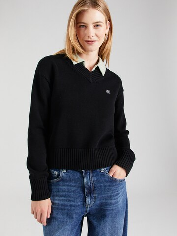 Pull-over Calvin Klein Jeans en noir : devant