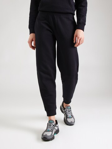 ASICS Tapered Workout Pants in Black: front
