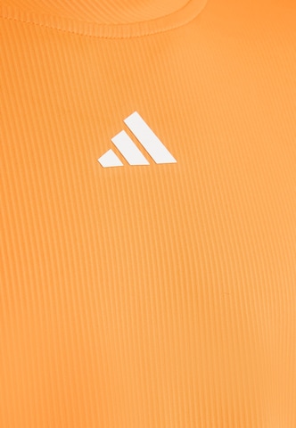 ADIDAS PERFORMANCE - Camiseta funcional 'FreeLift' en naranja