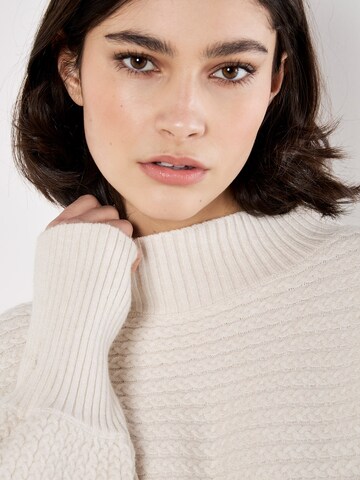 Pull-over ' ' Apricot en gris