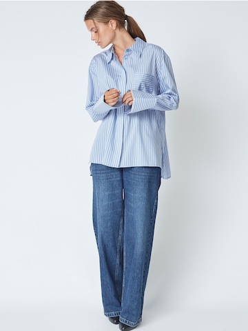 Chemisier 'Fina' co'couture en bleu