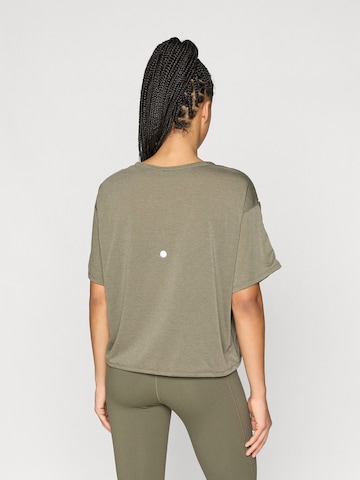 ASICS Funktionsshirt 'NAGINO' in Grün