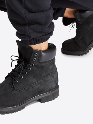 Boots stringati di TIMBERLAND in nero