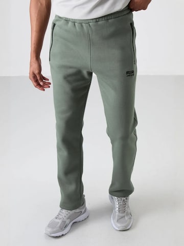 Tommy Life Szabványos Sportnadrágok 'Jogginghose' - zöld