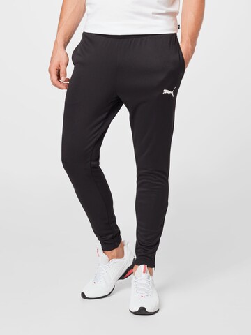 Effilé Pantalon de sport 'TeamRise' PUMA en noir : devant