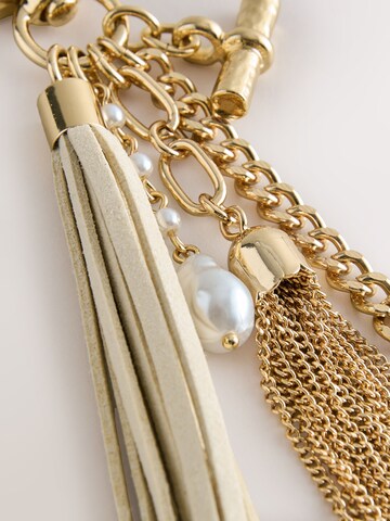 Next Taschenanhänger in Gold