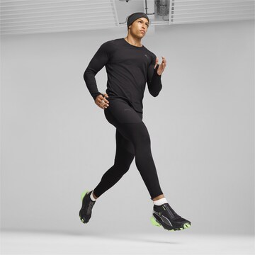 PUMA Functioneel shirt 'SEASONS' in Zwart
