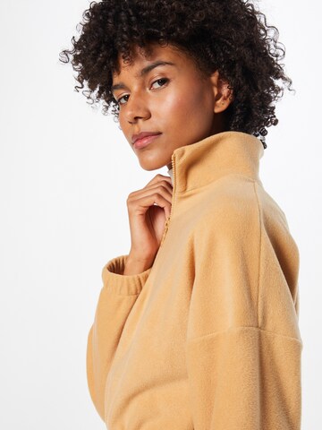 ABOUT YOU Sweatshirt 'Tania' in Beige