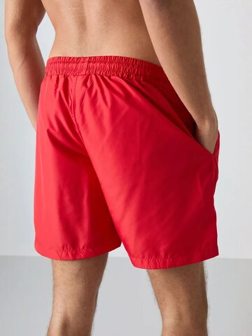 Regular Pantalon Tommy Life en rouge