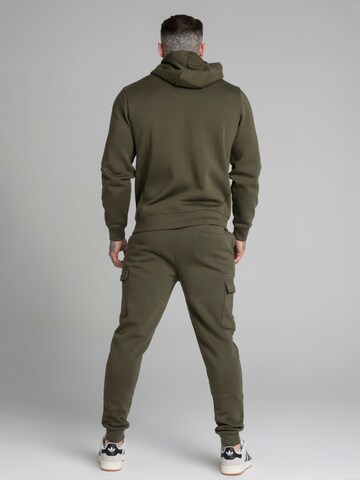 Tapered Pantaloni cargo di SikSilk in verde