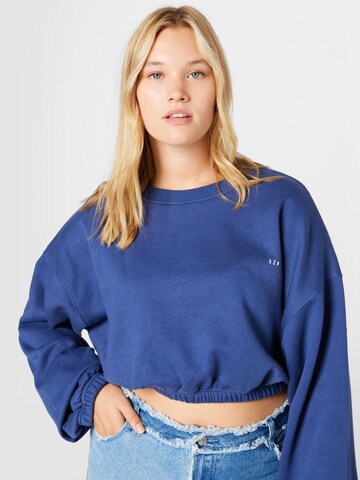 Public Desire Curve Sweatshirt in Blue