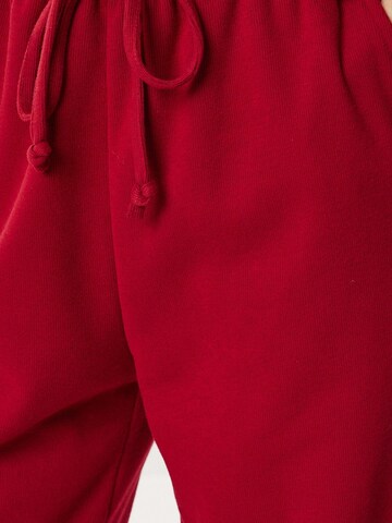 Wide leg Pantaloni 'Hose' di Happiness İstanbul in rosso