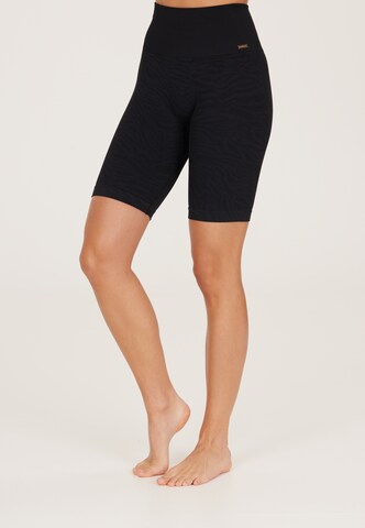 Athlecia - Skinny Pantalón deportivo 'Empower' en negro: frente