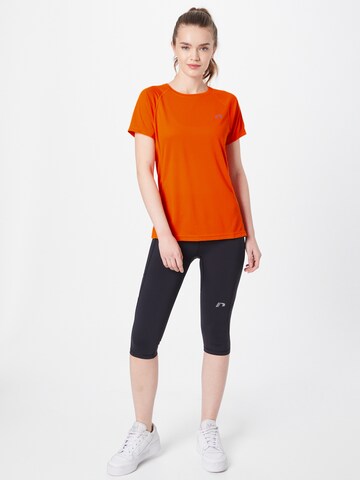 Newline - Camisa funcionais em laranja