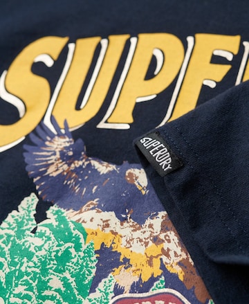 Superdry T-Shirt 'Travel Souvenir' in Blau