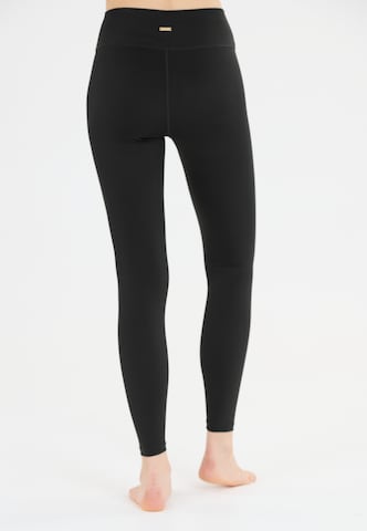 Athlecia Skinny Sports trousers 'Bloom' in Black