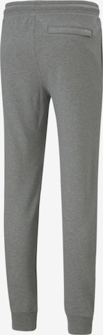 Effilé Pantalon de sport PUMA en gris