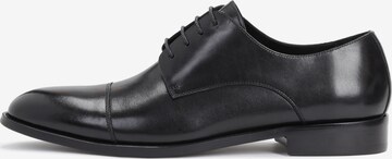 Kazar Lace-Up Shoes in Black: front