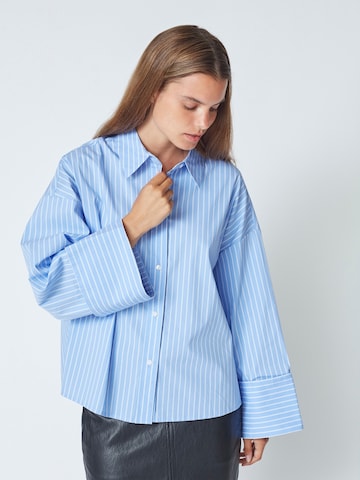 Chemisier 'Bianca' co'couture en bleu