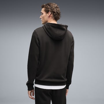 PUMA Sporttrui 'MARTIN ARAMCO F1® TEAM' in Zwart