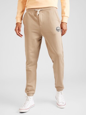 QS Tapered Broek in Beige: voorkant