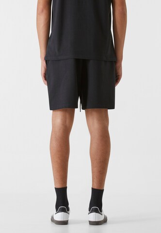 9N1M SENSE Regular Trousers in Black