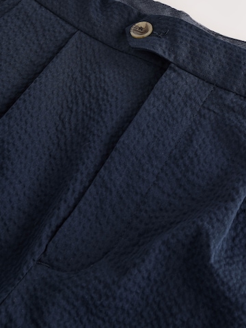 Slimfit Pantaloni con pieghe di Next in blu