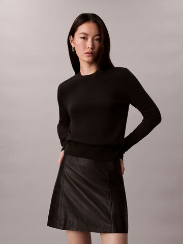 Pull-over Calvin Klein en noir : devant