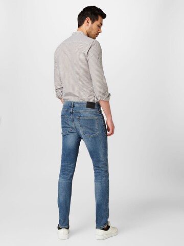 Lindbergh Slimfit Jeans 'Superflex' in Blauw