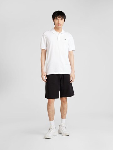 GUESS Loose fit Pants 'CLOVIS' in Black