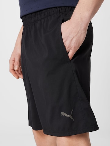 PUMA Regularen Športne hlače 'Blaster 7' | črna barva