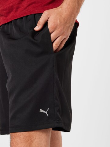 regular Pantaloni sportivi di PUMA in nero