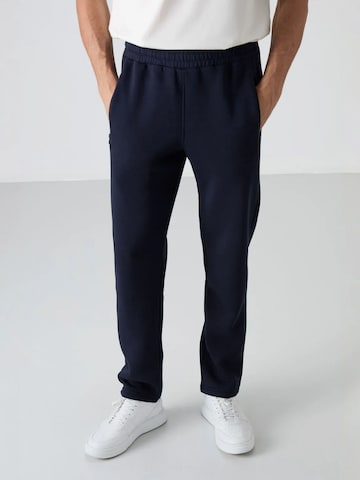 Pantaloni di Tommy Life in blu: frontale