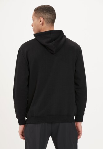 ENDURANCE Athletic Sweatshirt in Black