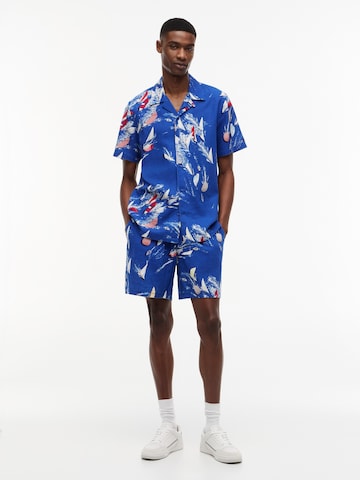 regular Pantaloni di Tommy Jeans in blu