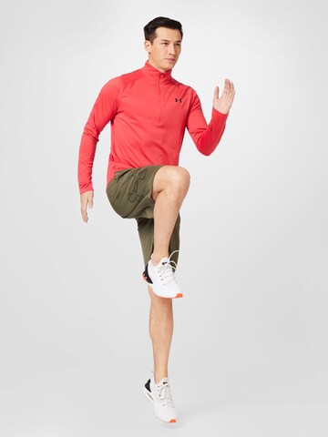 UNDER ARMOUR Lużny krój Spodnie sportowe w kolorze zielony