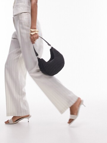 TOPSHOP Loosefit Pressveckad byxa i beige: framsida